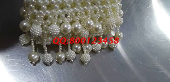 11月12日，多發(fā)材料，拿回家做的手工活，這個手工活外發(fā)加工企業(yè)一直這樣做，圖為勵志珠珠繡手工珠包成品實拍